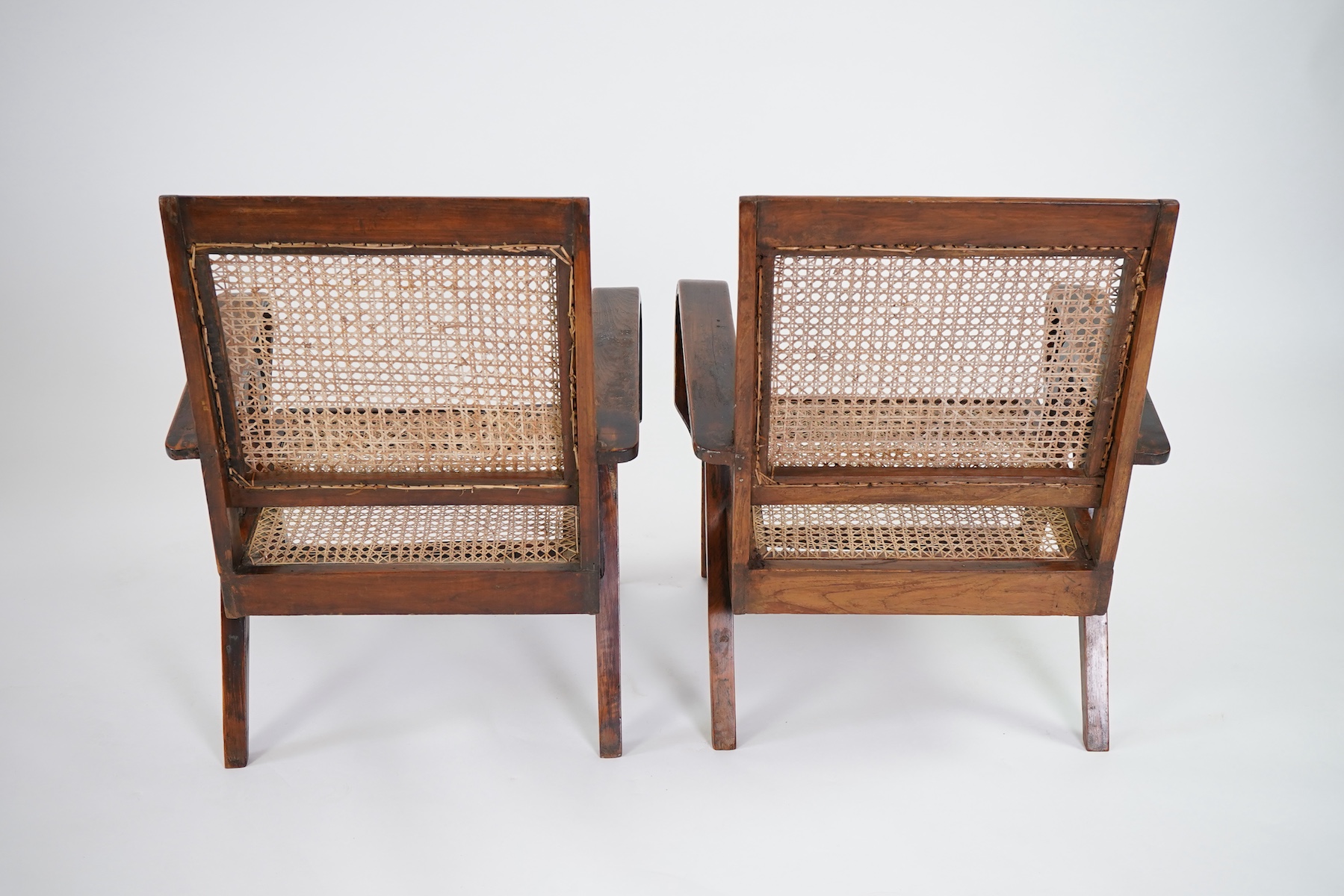 Pierre Jeanneret (Swiss, 1896-1967) for Chandigarh: A pair of teak armchairs PJ-010610